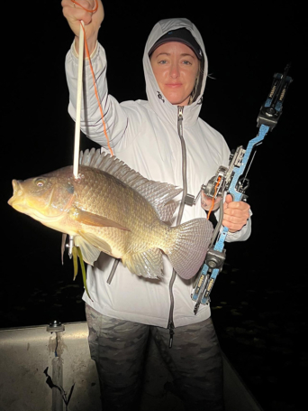 Bow Fishing trip lands a huge tilapia in South Florida