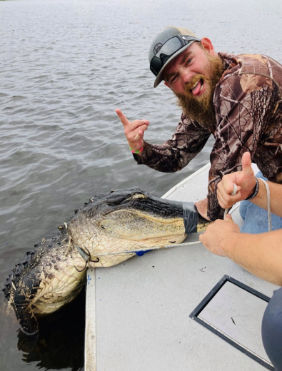 Captain Skeeter getting it done for a happy client on a Gator Hunting Trip