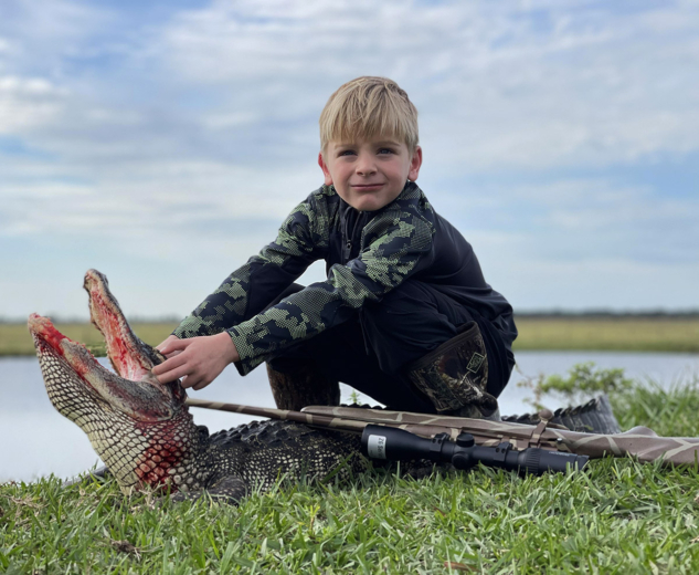 Family friendly alligator hunting trip get this young man his first gator